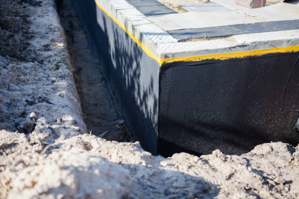 Professional Waterproofing technician working in Georgetown, SC